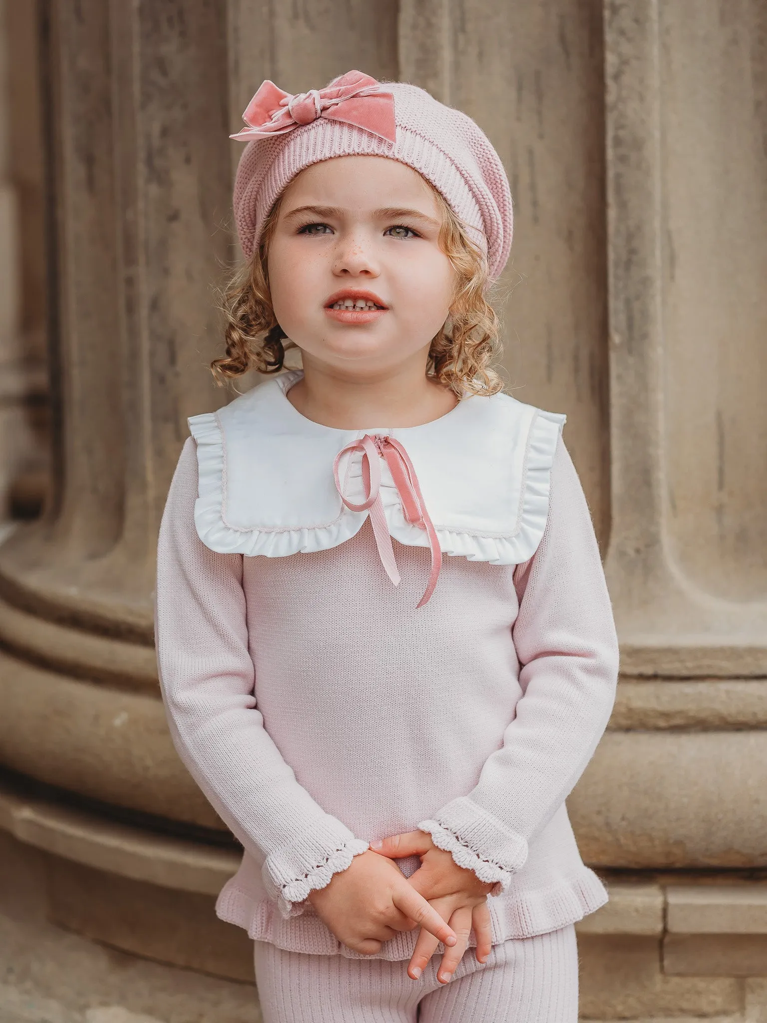 'Etta' pink knitted suit with bib collar