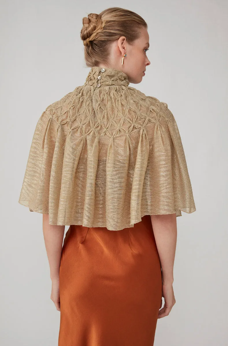 HANDSMOCKED CAPE - GOLD