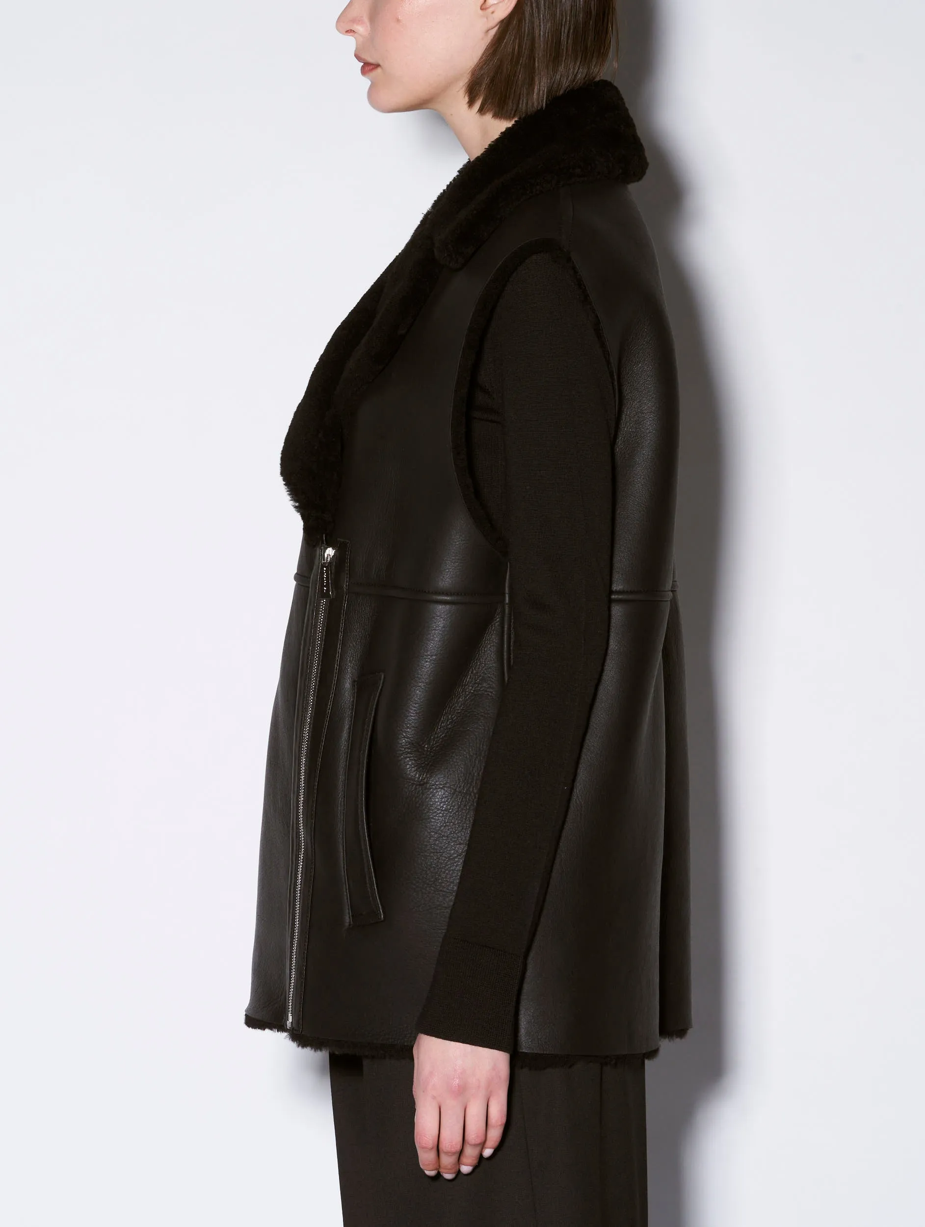 Sleeveless black shearling jacket