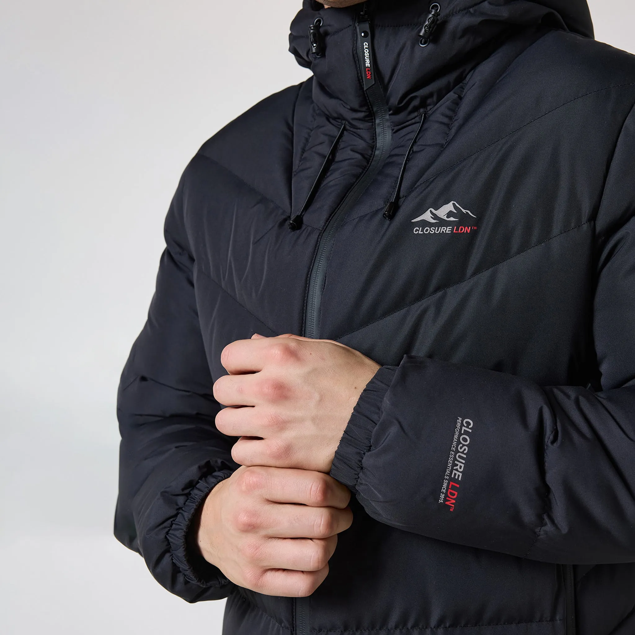 Tech Logo Racer Puffer Jacket | Black