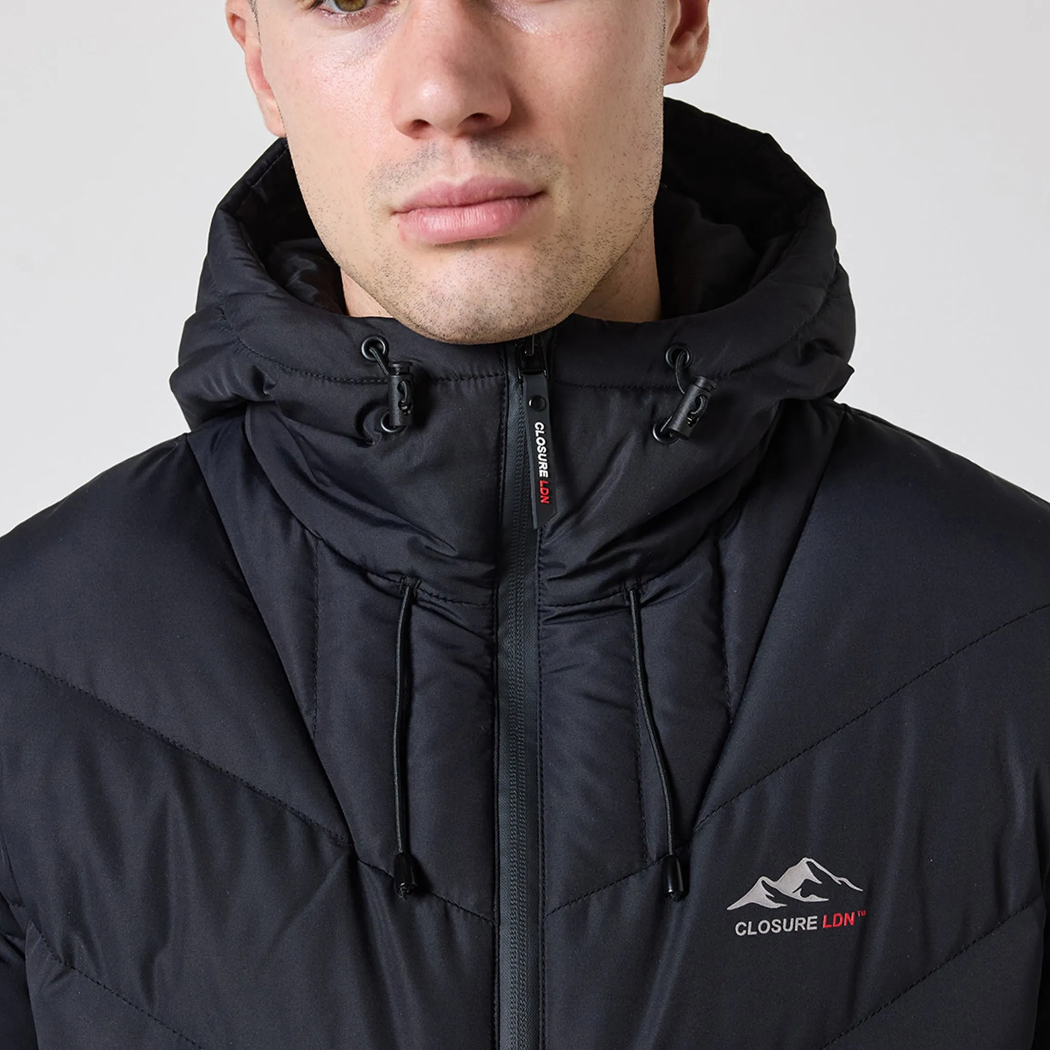 Tech Logo Racer Puffer Jacket | Black